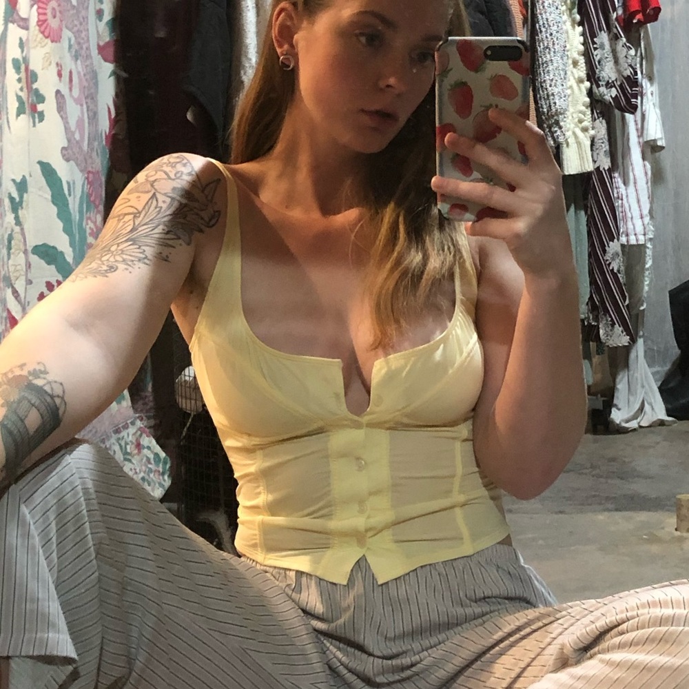 Adorable corset cami, OUT FROM UNDER, size large- runs small. Yellowish cream